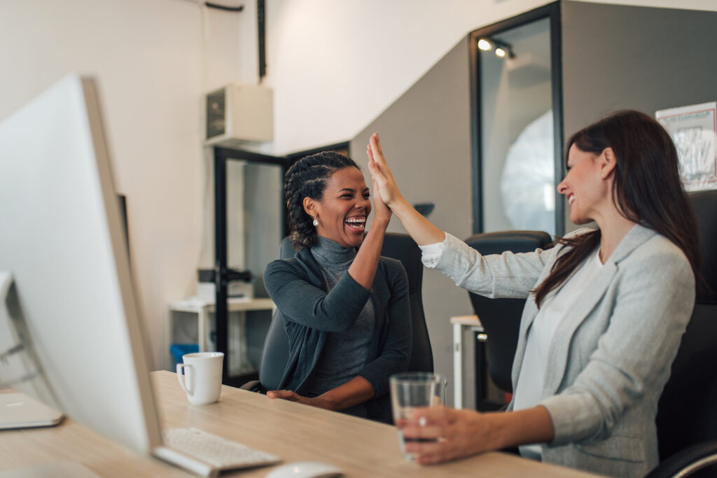 Coworkers celebrating success